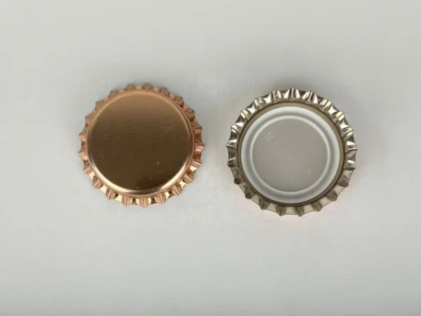 Pivné zátky Metalická ružová (26mm) - 100ks
